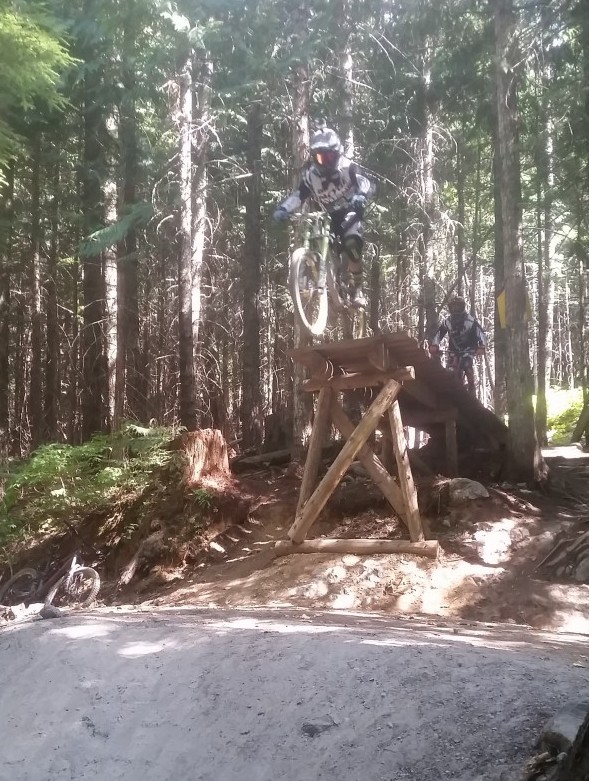 Trainees riding Whistler Mountain Bike Parks Fade to Black trail
