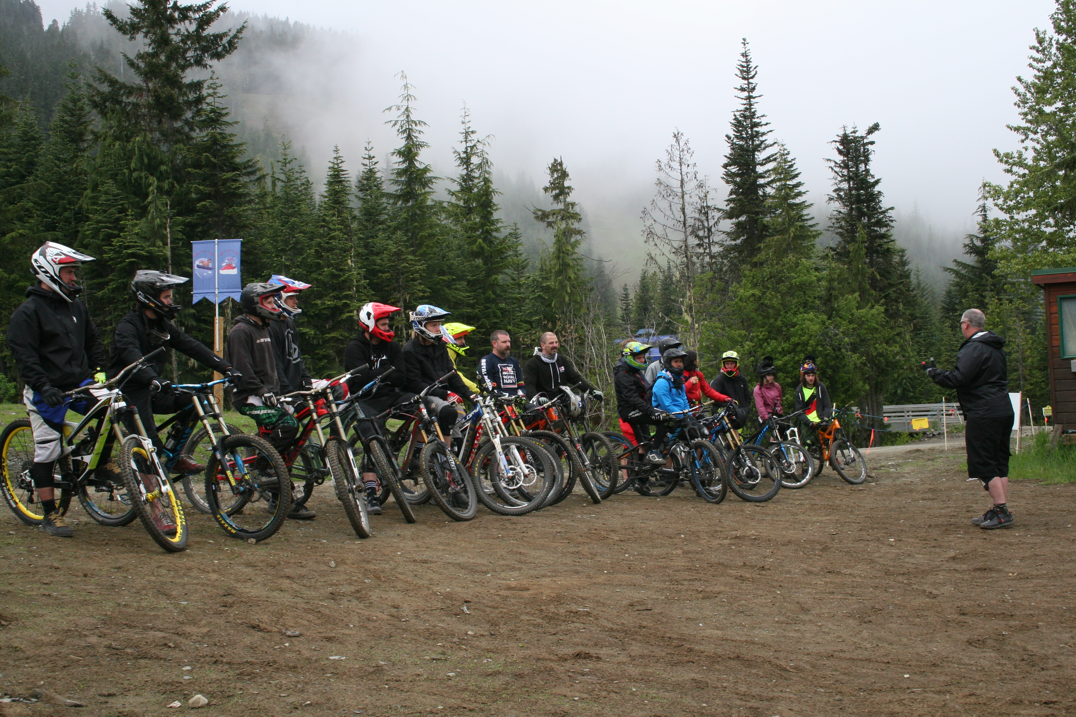 Mike from Terramethod begins the Bike Limbo game at the Skills Centre with the Qualified Whistler Mountain Bike Guides
