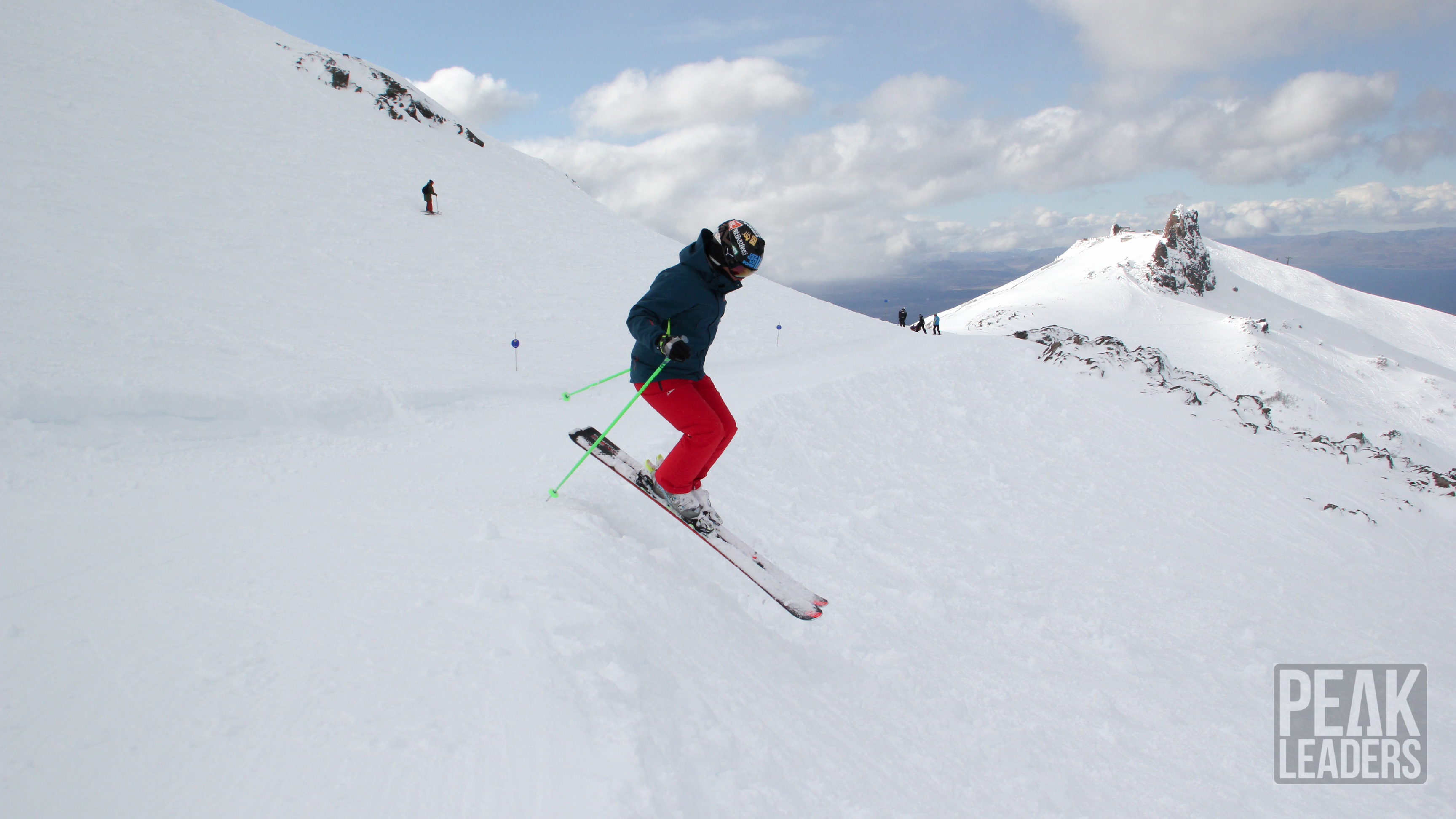 Ski Instructor graduate practicing downhill skiing